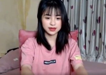 A estudante universitária de Ho Chi Minh postou um show de vídeo cena de cachorro com seu amante
